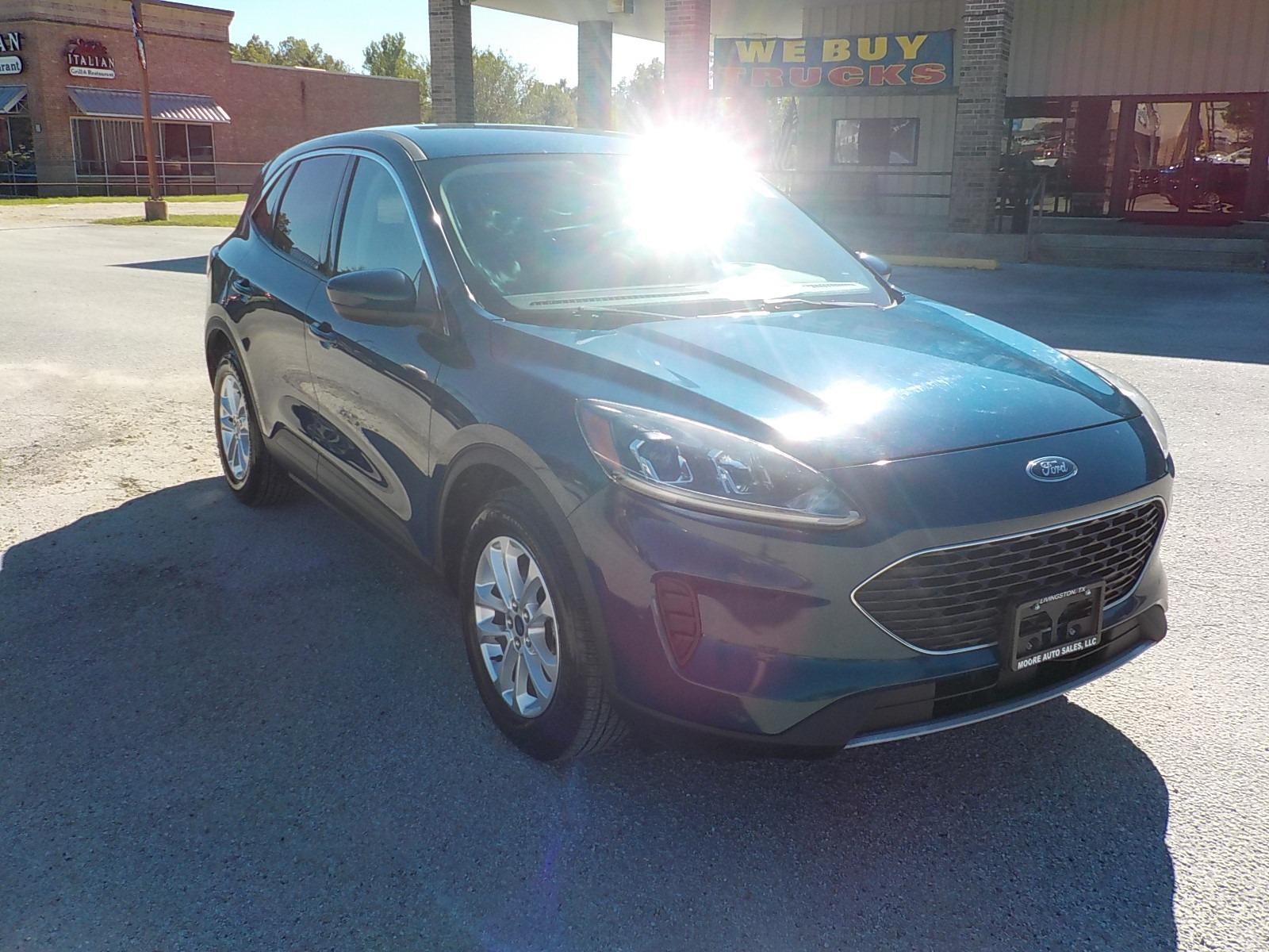 2020 Green Ford Escape (1FMCU0G69LU) with an 3 cyl engine, Automatic transmission, located at 1617 W Church Street, Livingston, TX, 77351, (936) 327-3600, 30.710995, -94.951157 - Love these!! Great economy in a comfortable ride! - Photo #1
